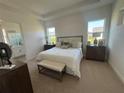 Spacious main bedroom with ensuite bathroom and plush carpeting at 5007 Dancy Ln, Saint Cloud, FL 34772