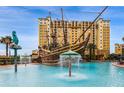 Resort-style pool with a pirate ship water feature, creating a playful and fun atmosphere at 8112 Poinciana Blvd # 1709, Orlando, FL 32821