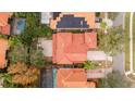 Aerial top-down view of a house with red tile roof at 11410 Rapallo Ln, Windermere, FL 34786