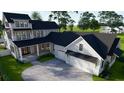 Luxury two-story farmhouse with large backyard and attached garage at 1258 Ridge Lake Way, Oakland, FL 34787