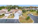 House with a two-car garage and a spacious yard at 3965 Journey Ct, Casselberry, FL 32707
