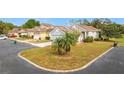 Community view showing multiple houses and landscaping at 3965 Journey Ct, Casselberry, FL 32707