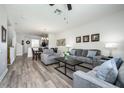 Open living room, dining area, and kitchen at 8001 Cool Breeze Dr # 121, Orlando, FL 32819