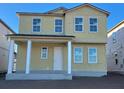 Front exterior view of a two-story home under construction at 2372 Broadbrook Dr, Saint Cloud, FL 34771