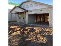 A house under construction with exposed framing and concrete block walls at 5710 Cattle Ranch Dr, Saint Cloud, FL 34771