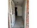 Front entrance with tiled floor and view into the house at 1918 Mountain Lake Cutoff Rd, Lake Wales, FL 33859