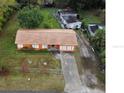 Aerial view of a single-story orange house at 5165 Gwynne Ave, Orlando, FL 32810