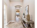 Bright and spacious entryway with tile flooring and console table at 1415 Caring Ct, Maitland, FL 32751