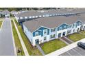 Aerial view of townhomes and surrounding community at 4250 Lana Ave, Davenport, FL 33897