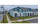 View of townhome with street and walkway access at 4250 Lana Ave, Davenport, FL 33897