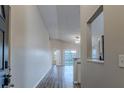 Bright entryway with vinyl flooring leading to living room at 5436 Wood Crossing St, Orlando, FL 32811
