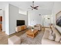 Bright living room with hardwood floors and neutral decor at 3218 Ginger Cir, Orlando, FL 32826