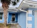 Front entrance with light blue walls and a walkway at 762 Rosalie Way, Winter Springs, FL 32708
