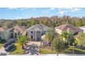 Luxury home in a quiet residential neighborhood with mature trees at 9168 Lake Avon Dr, Orlando, FL 32829