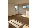Spacious carpeted bedroom with large windows and ample natural light at 1005 Chase Dr, Winter Garden, FL 34787
