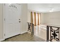 Bright entryway with tiled floors and view to living room at 7201 Pleasant Dr, Orlando, FL 32818