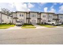 Townhouse community with multiple units and street view at 823 Longboat Dr, Davenport, FL 33896