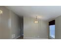 Bright living room featuring tile floors and a chandelier at 5453 Shingle Creek Dr, Orlando, FL 32821