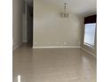 Spacious living room with tile floors and a high ceiling at 5453 Shingle Creek Dr, Orlando, FL 32821