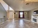 Open living area with tile floors and high ceilings at 224 Fairfield Dr, Sanford, FL 32771
