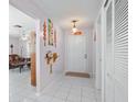 Bright entryway with tile flooring and access to living areas at 112 Blackwater Ct, Kissimmee, FL 34743