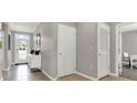 Open hallway with tile floors and neutral wall colors at 3234 Belize Pl, Haines City, FL 33844