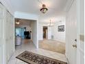 Bright entryway with tile floors and views into living areas at 117 Red Rose Cir, Orlando, FL 32835
