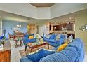 Spacious living room with comfortable seating and high ceilings at 1636 Moon Valley Dr, Davenport, FL 33896