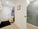 Bright entryway with tile flooring and bench at 2766 White Isle Ln, Orlando, FL 32825