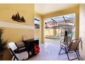 Relaxing patio with pool view and seating at 8939 Bismarck Palm Rd, Kissimmee, FL 34747