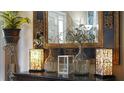 Elegant entryway decor with lamps and decorative vases at 607 Pensacola Ln, Lake Mary, FL 32746