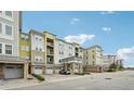 Multi-level apartment building with parking and outdoor space at 7517 Laureate Blvd # 4205, Orlando, FL 32827