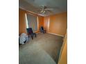 Bright bedroom with neutral carpeting and window coverings at 4136 Versailles Dr # 4136D, Orlando, FL 32808