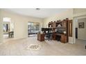 Home office with built-in shelves and plenty of natural light at 1855 S Lehigh Dr, Deltona, FL 32738