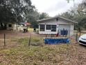Backyard with patio furniture and storage shed at 14917 Se 106Th Ave, Summerfield, FL 34491
