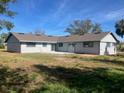 Newly renovated single-Gathering home with a large backyard at 5241 Magnolia Ter, Fruitland Park, FL 34731