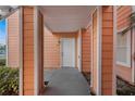 Covered walkway leading to condo entrance at 8709 Rockingham Ter # A, Kissimmee, FL 34747