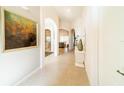 Bright and spacious entryway with high ceilings and modern decor at 4027 Oakrise Loop, Davenport, FL 33837