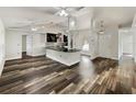 Modern living area, open layout with kitchen and dining area at 5933 Bible Camp Rd, Groveland, FL 34736