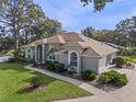 Single-Gathering home with a large backyard and mature trees at 897 Eagle Claw Ct, Lake Mary, FL 32746