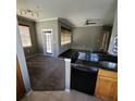 Kitchen with granite countertops and wooden cabinets at 2598 Robert Trent Jones Dr # 1010, Orlando, FL 32835