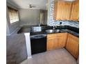 Kitchen boasts granite countertops and modern appliances at 2598 Robert Trent Jones Dr # 1010, Orlando, FL 32835