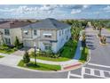Two-story house on a corner lot with a neighborhood view at 8929 Amelia Downs Trl, Kissimmee, FL 34747
