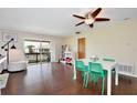 Bright dining area with hardwood floors and access to a balcony at 600 Northern Way # 1608, Winter Springs, FL 32708