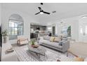 Bright and airy living room with an open floor plan and modern furniture at 3149 Bear Path, Kissimmee, FL 34746