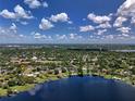 Aerial view showing home's waterfront location and surrounding area at 245 Lake Seminary Cir, Maitland, FL 32751