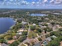 Aerial view of the house, showcasing its location near a lake at 245 Lake Seminary Cir, Maitland, FL 32751
