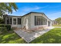 Well-maintained manufactured home with attractive landscaping at 1618 Cypress Pt, Lady Lake, FL 32159
