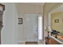 Bright entryway with tile floor and neutral walls at 5247 Nw 18Th St, Ocala, FL 34482