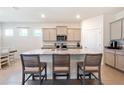 Spacious kitchen featuring a large island with granite countertops and stainless steel appliances at 4336 Nw 55Th Ct, Ocala, FL 34482